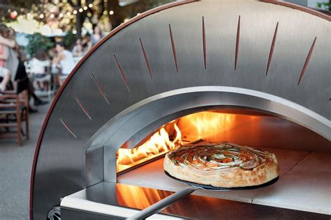 Industrial pizza - The Neapolitan pizza ovens by Marra Forni are the original brick ovens used by professional Pizzaioli worldwide. Available in a variety of sizes, these commercial ovens feature a static cooking deck and are engineered specifically to accommodate high-volume pizza making of a true pizzaiolo.. The Marra Forni Neapolitan Pizza Oven is available in either electric, …